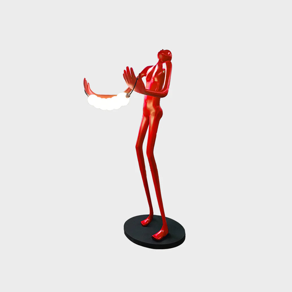 Lámpara de pie de escultura humana con cabeza inclinada