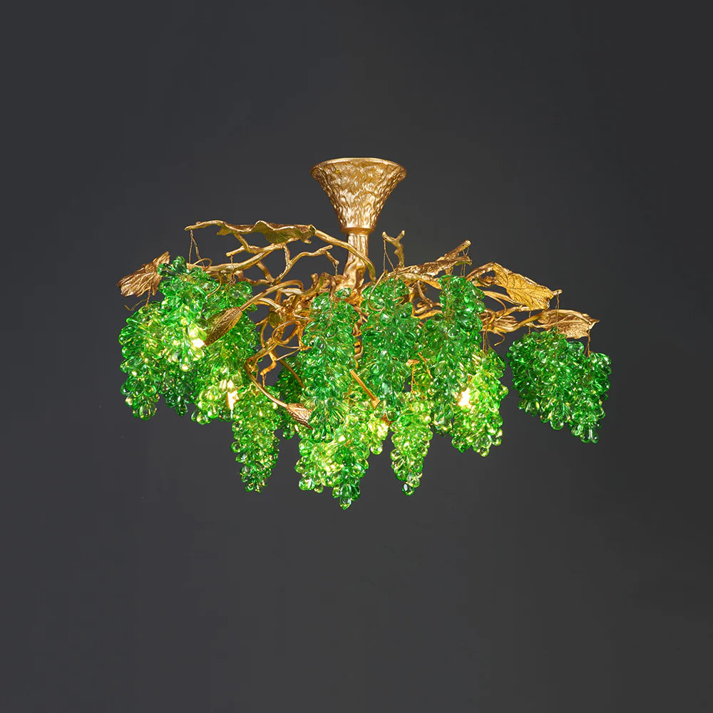Candelabro de uvas de cristal y ramas de árbol