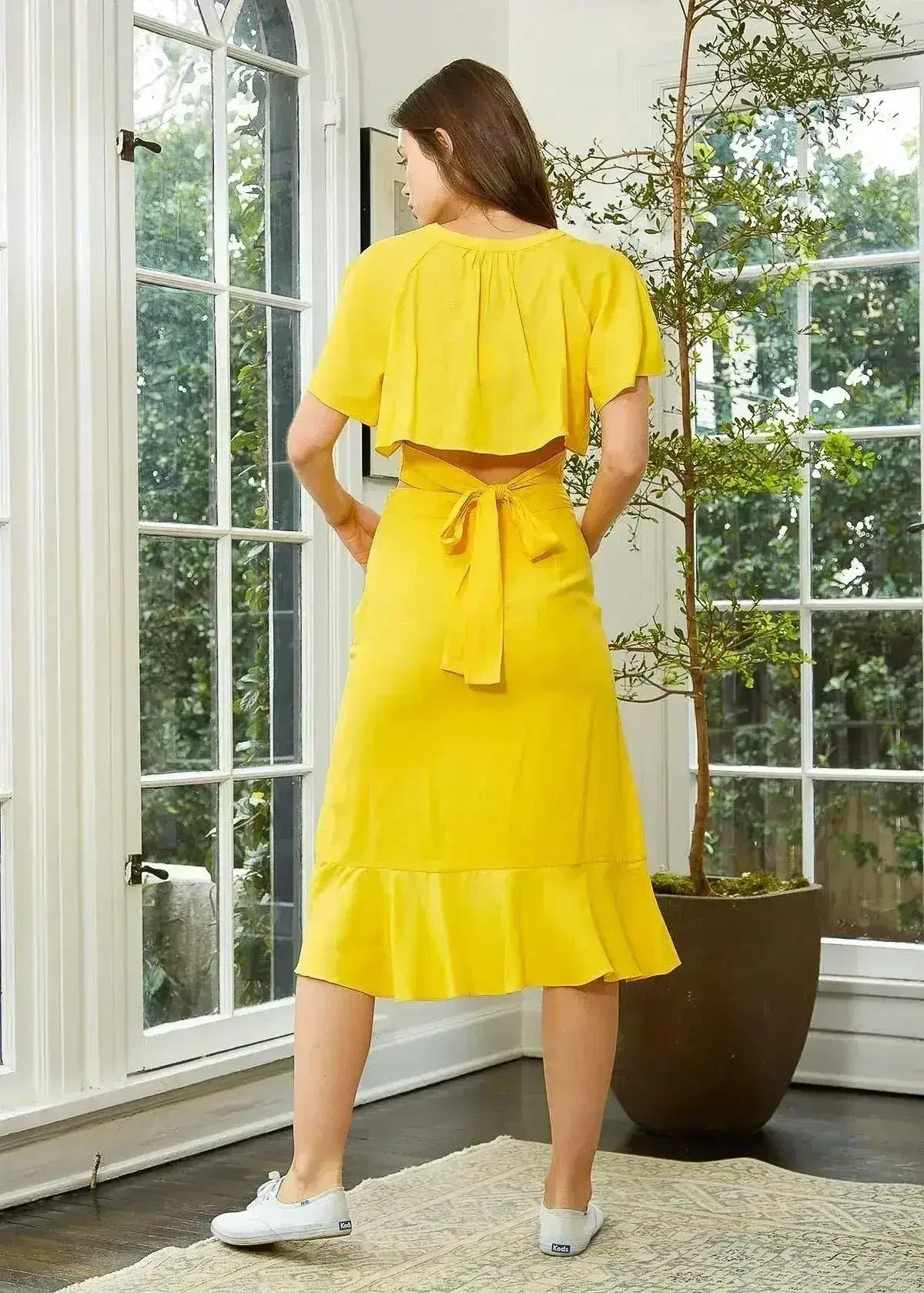 Women's Asymmetrical Hem Button Front Skirt in Yellow