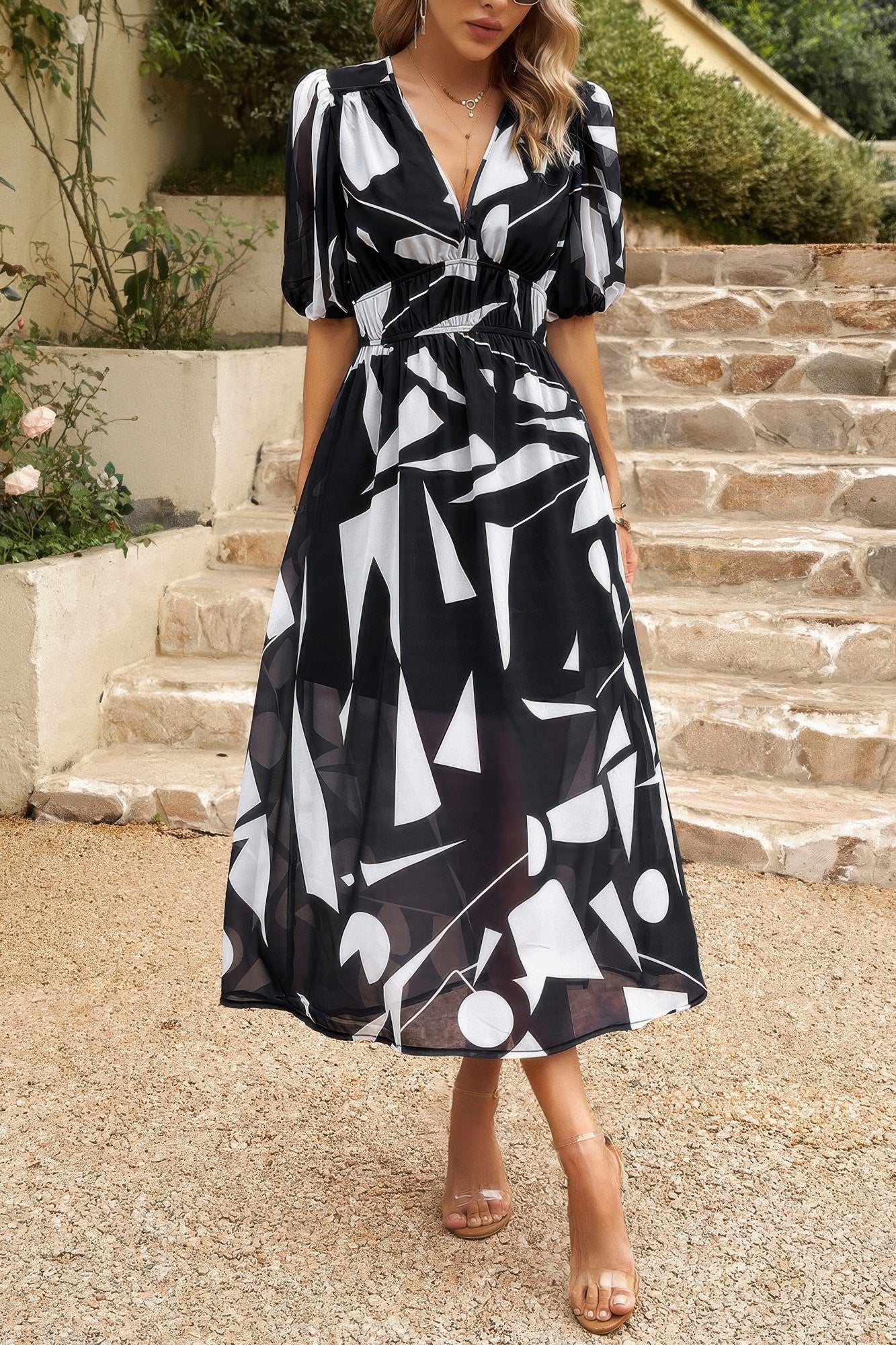 Vestido midi bohemio con cuello en V y cintura elástica. Consulta la tabla de tallas en "más detalles".