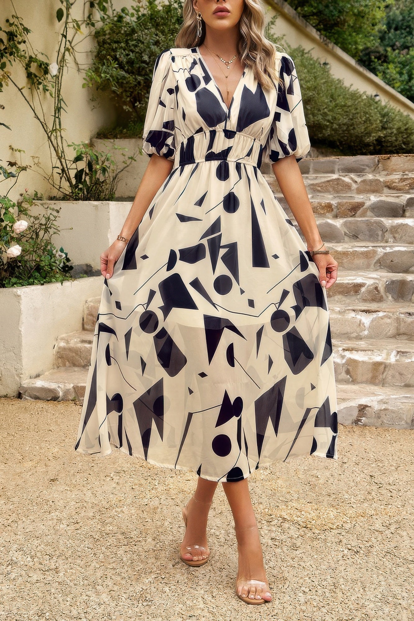 Vestido midi bohemio con cuello en V y cintura elástica. Consulta la tabla de tallas en "más detalles".