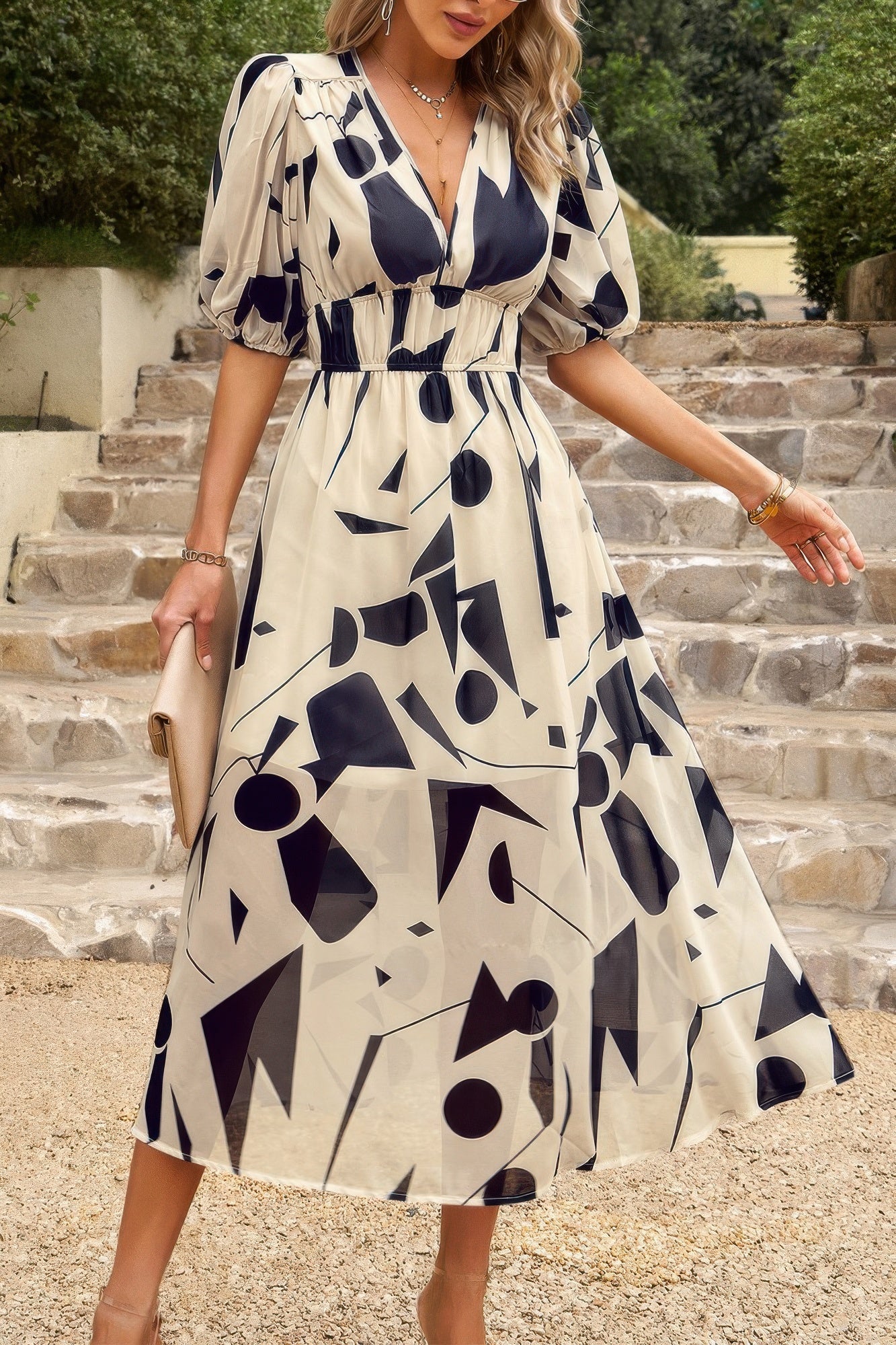 Vestido midi bohemio con cuello en V y cintura elástica. Consulta la tabla de tallas en "más detalles".