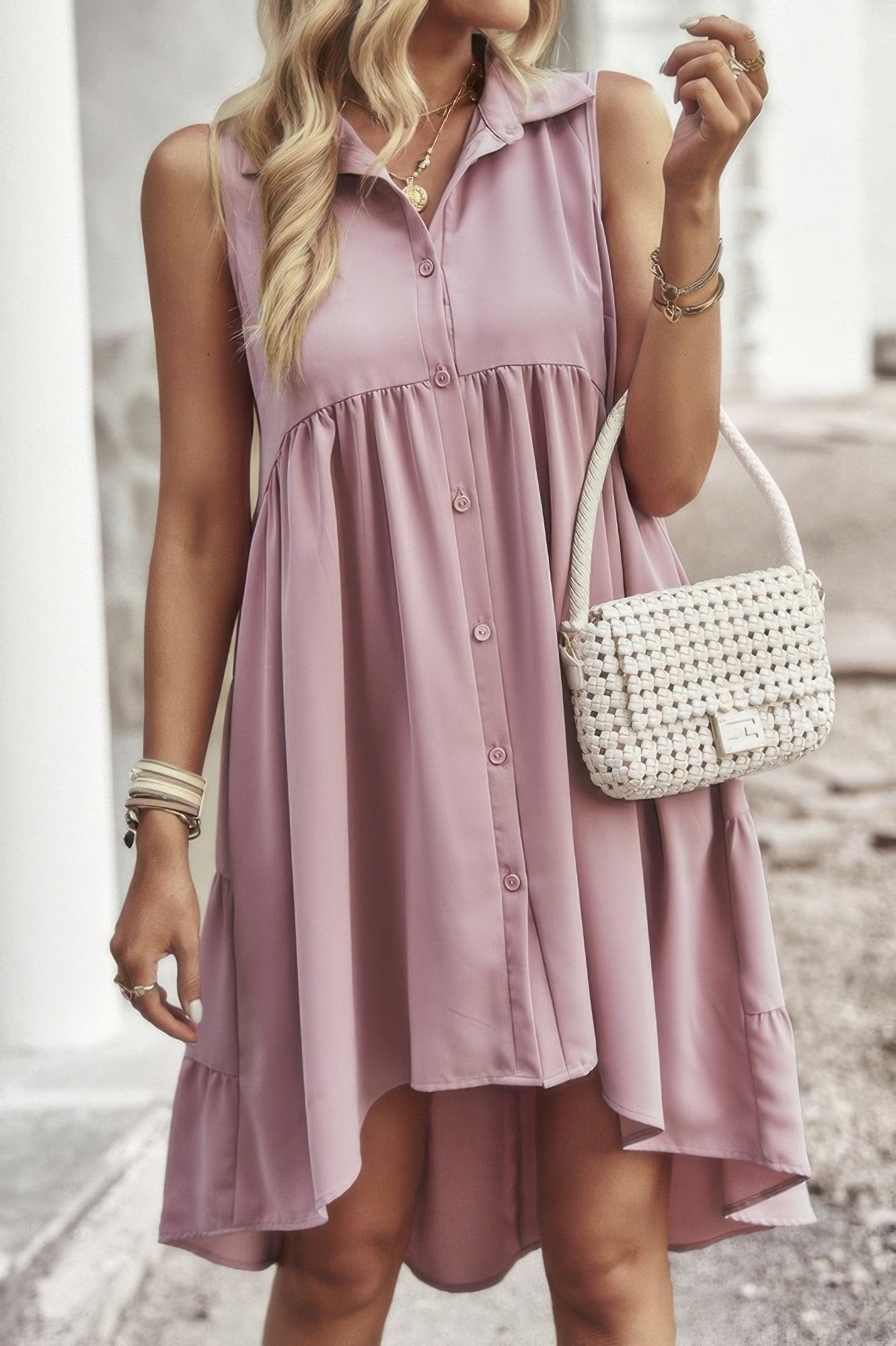 Vestido camisero peplum sin mangas liso. Consulta la tabla de tallas en "más detalles".