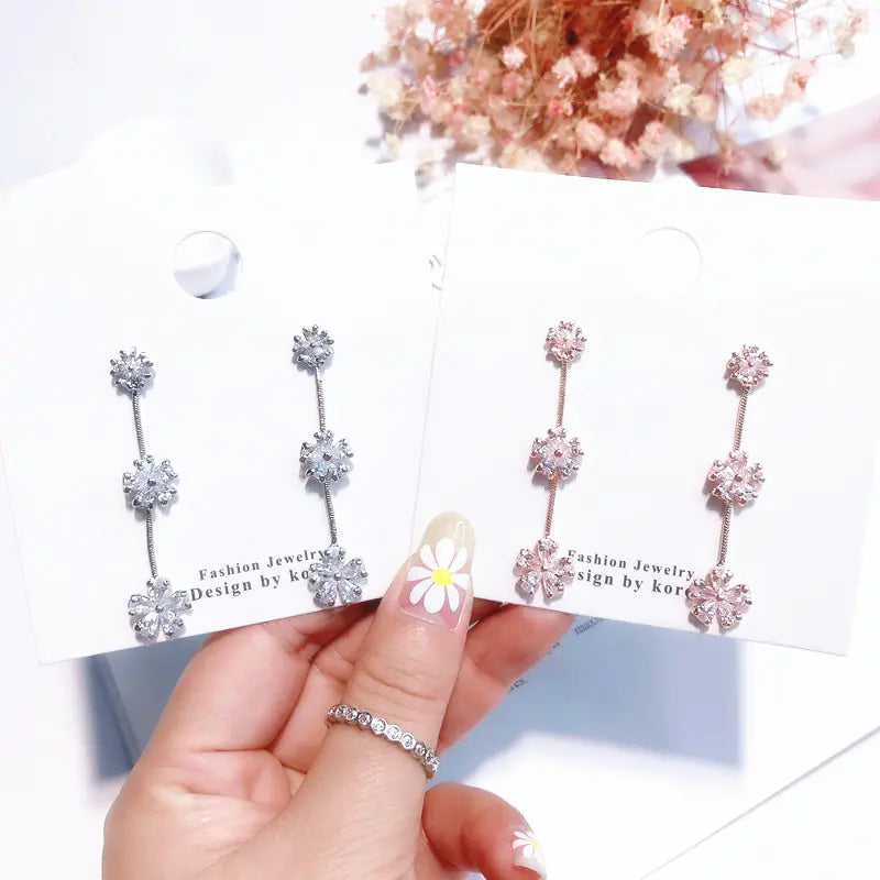 Pendientes largos de copo de nieve con diamantes de imitación y pines de plata 925
