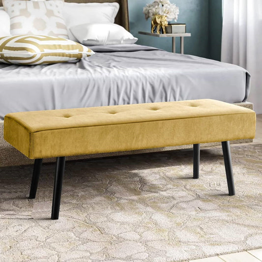 Banco tapizado de pana amarilla moderna para pie de cama con patas de metal negras