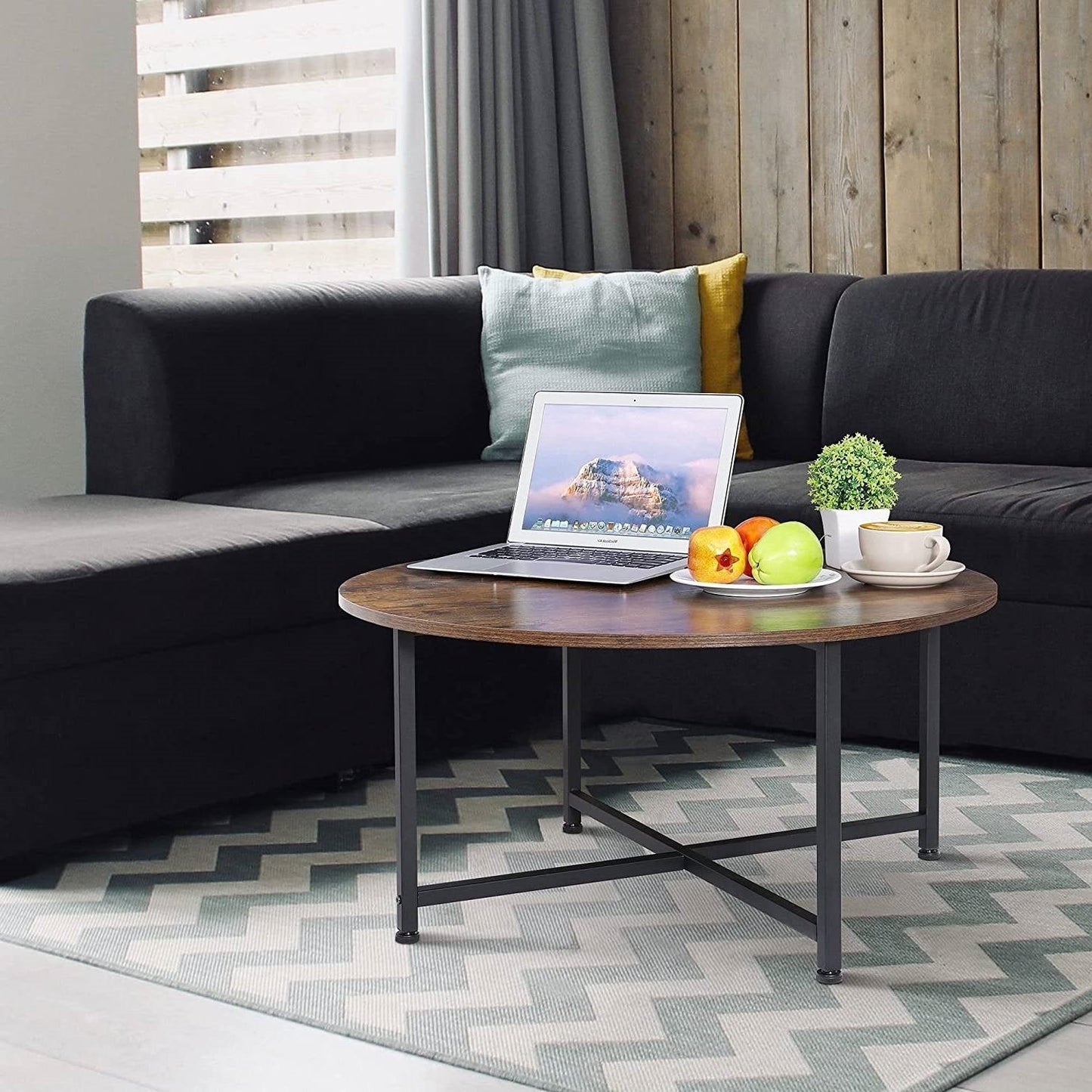 Mesa de centro industrial redonda moderna con superficie de madera rústica marrón