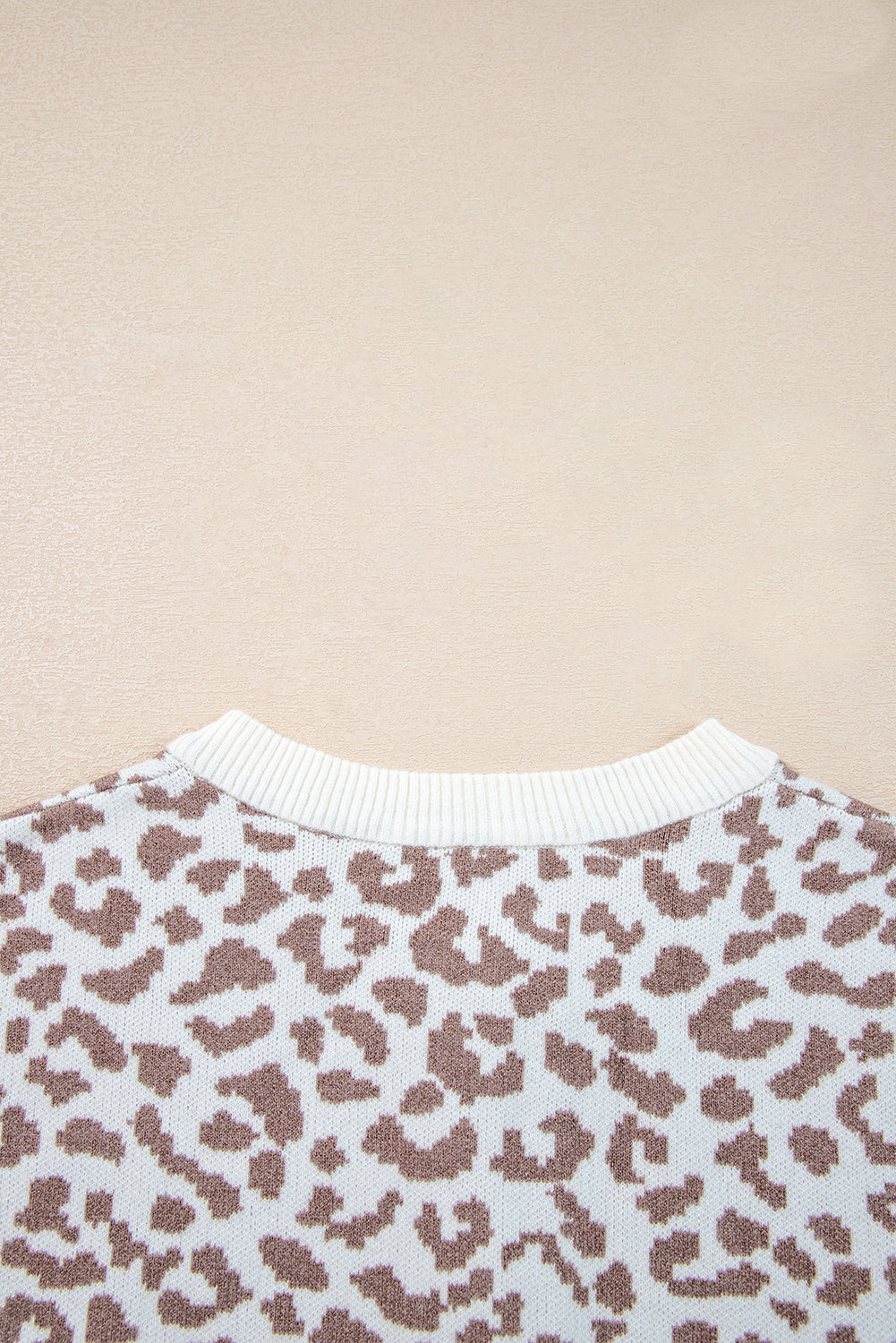 Cárdigan de punto de hombros caídos con estampado de leopardo naranja