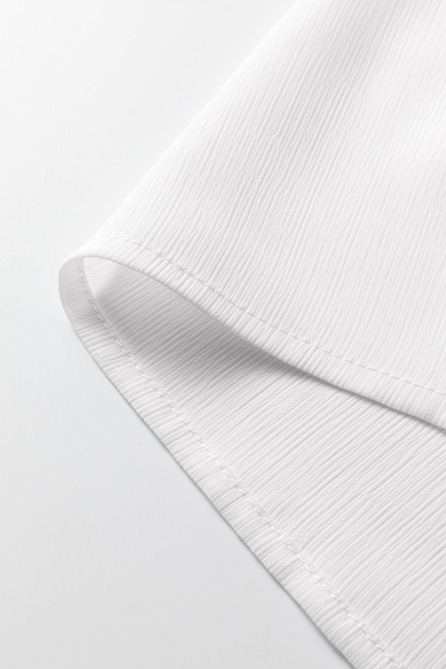 Blusa dolmán de manga larga semitransparente con puños blancos fruncidos