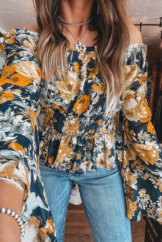 Top peplum de manga acampanada con hombros descubiertos y estampado floral azul