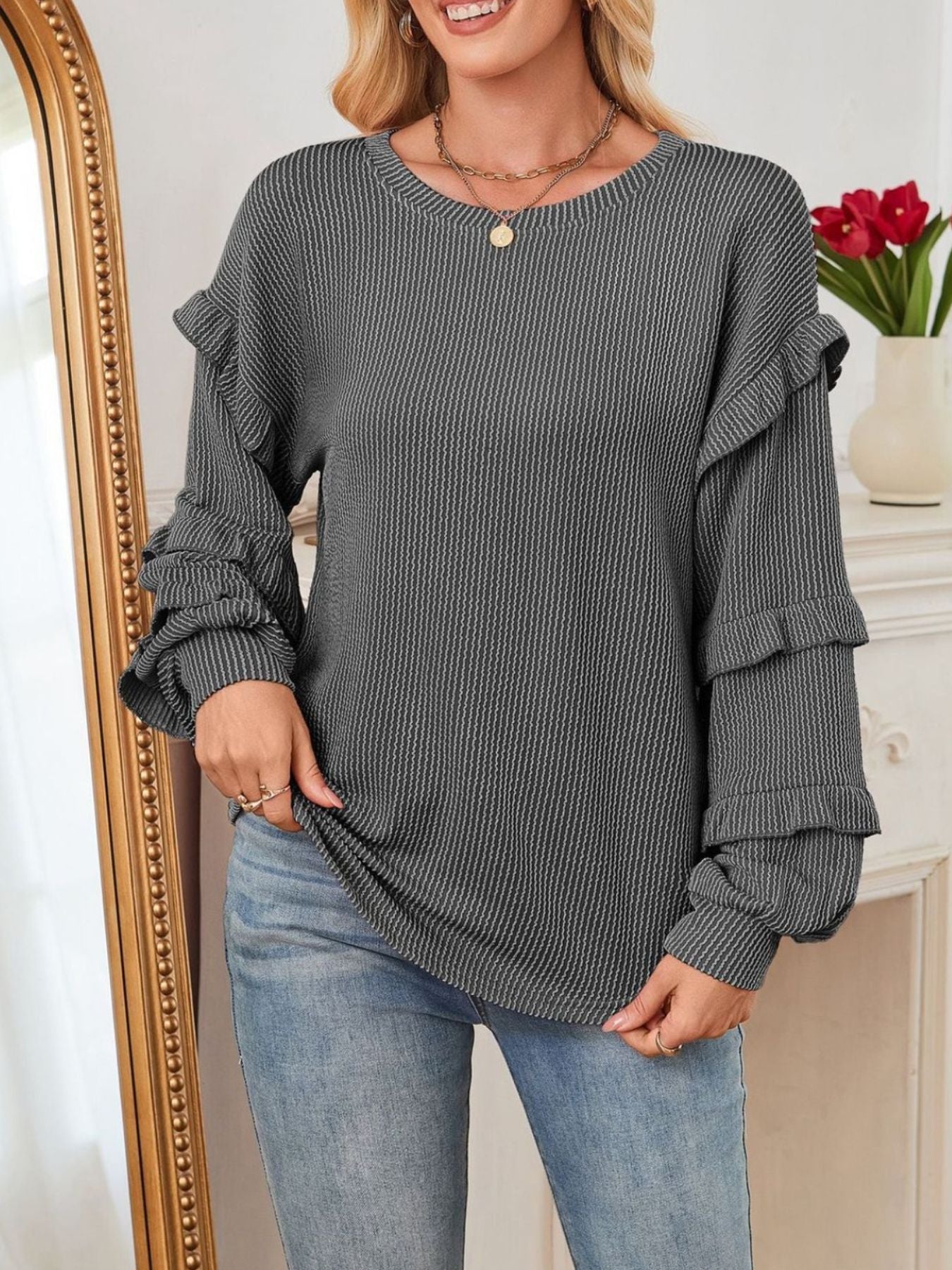Blusa de manga larga con volantes