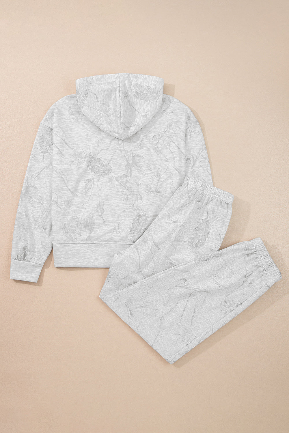 Conjunto de sudadera con capucha y pantalón holgado con estampado de camuflaje de plumas gris claro y manga caída