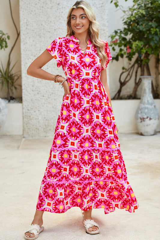Vestido largo con estampado abstracto rosa fresa, plisado y mangas con volante