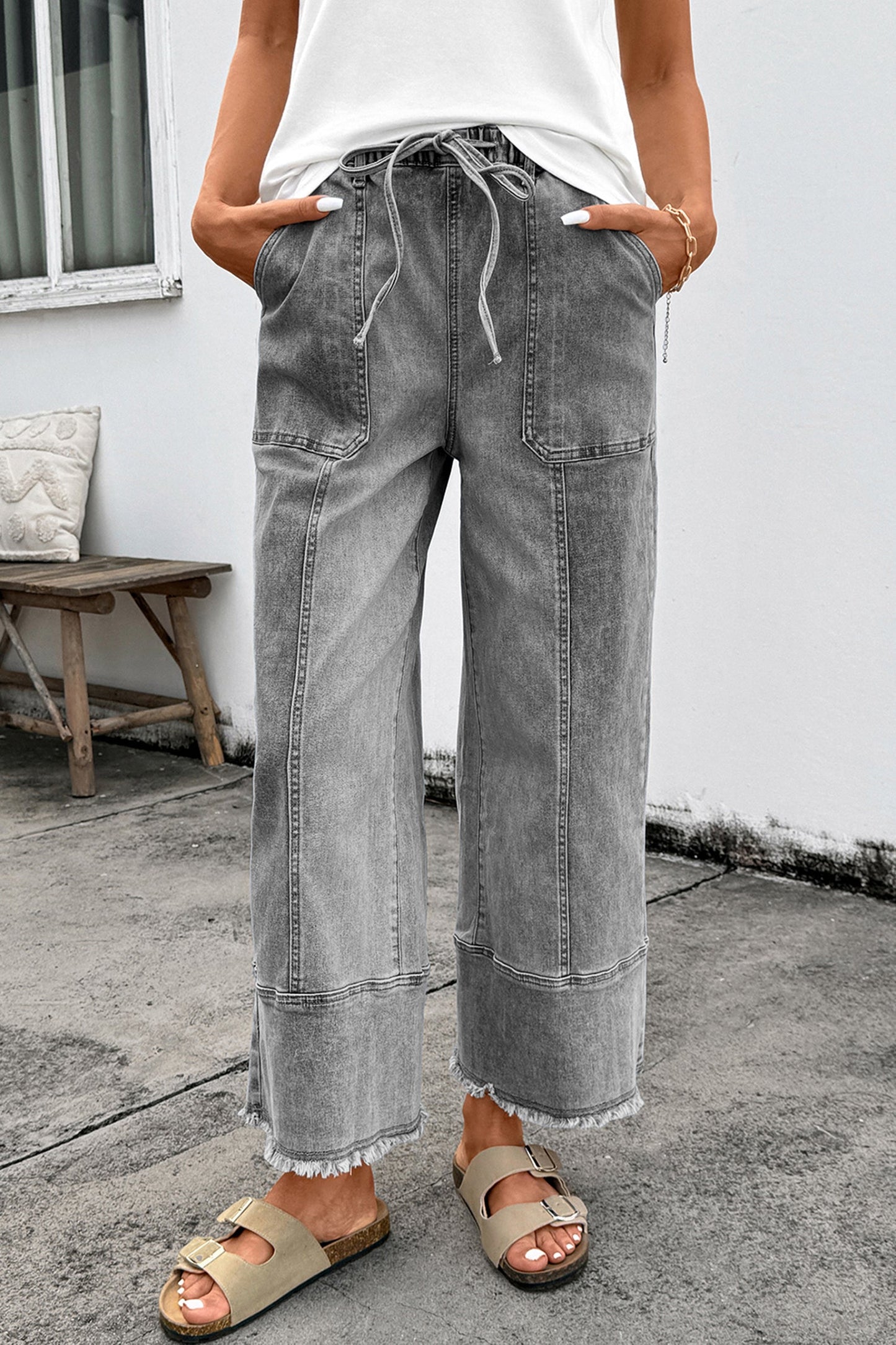 Pantalones vaqueros de pierna ancha con cordón azul de Prusia, detalle de costura y dobladillo sin rematar