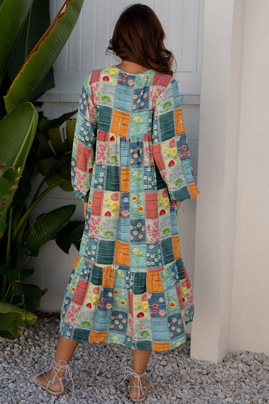 Vestido con estampado floral a cuadros, manga farol y bajo con volantes en azul cielo