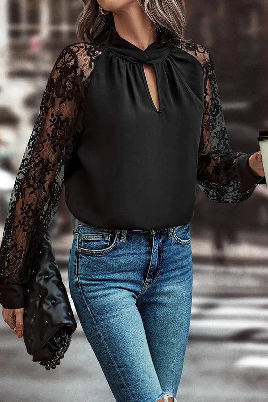 Blusa de manga larga con detalles de encaje calado