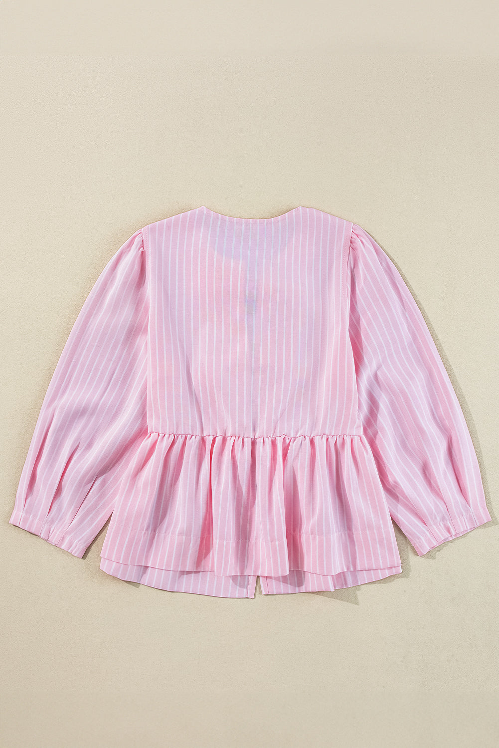 Blusa de cuello redondo a rayas con lazo