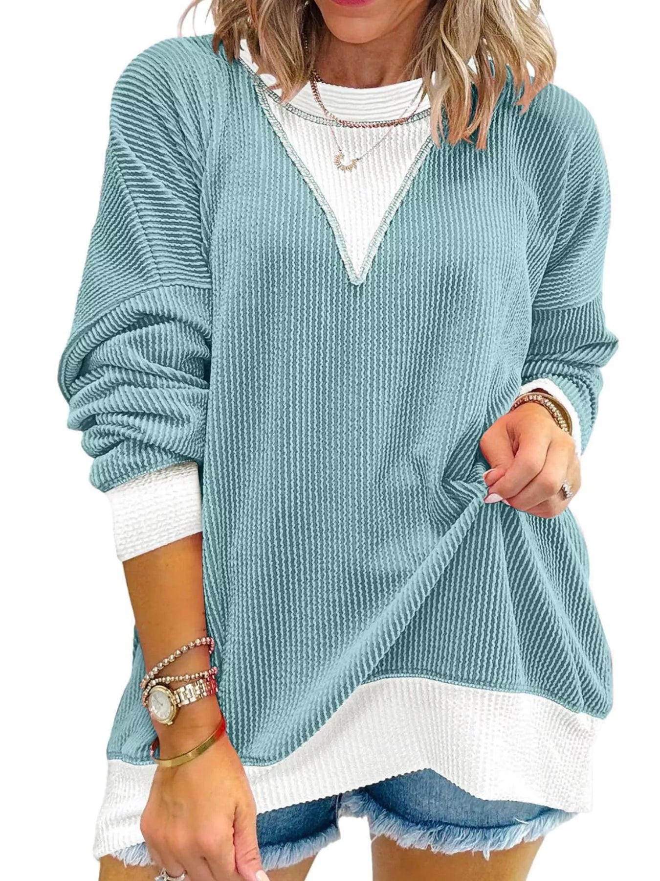 Sudadera de hombros caídos en contraste