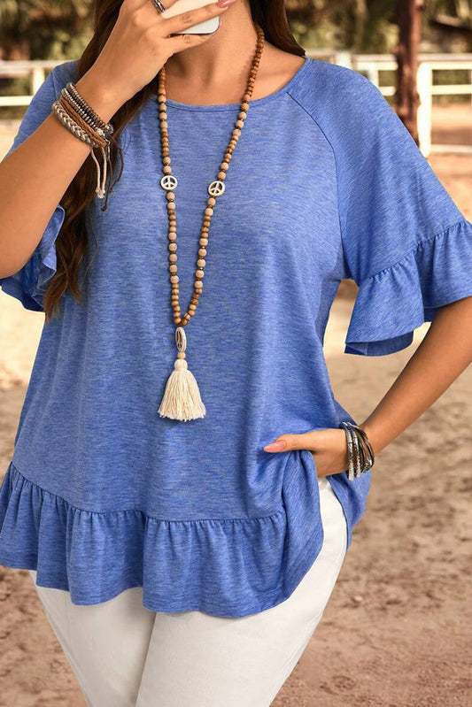 Blusa suelta de talla grande con volantes en el bajo color azul anochecer
