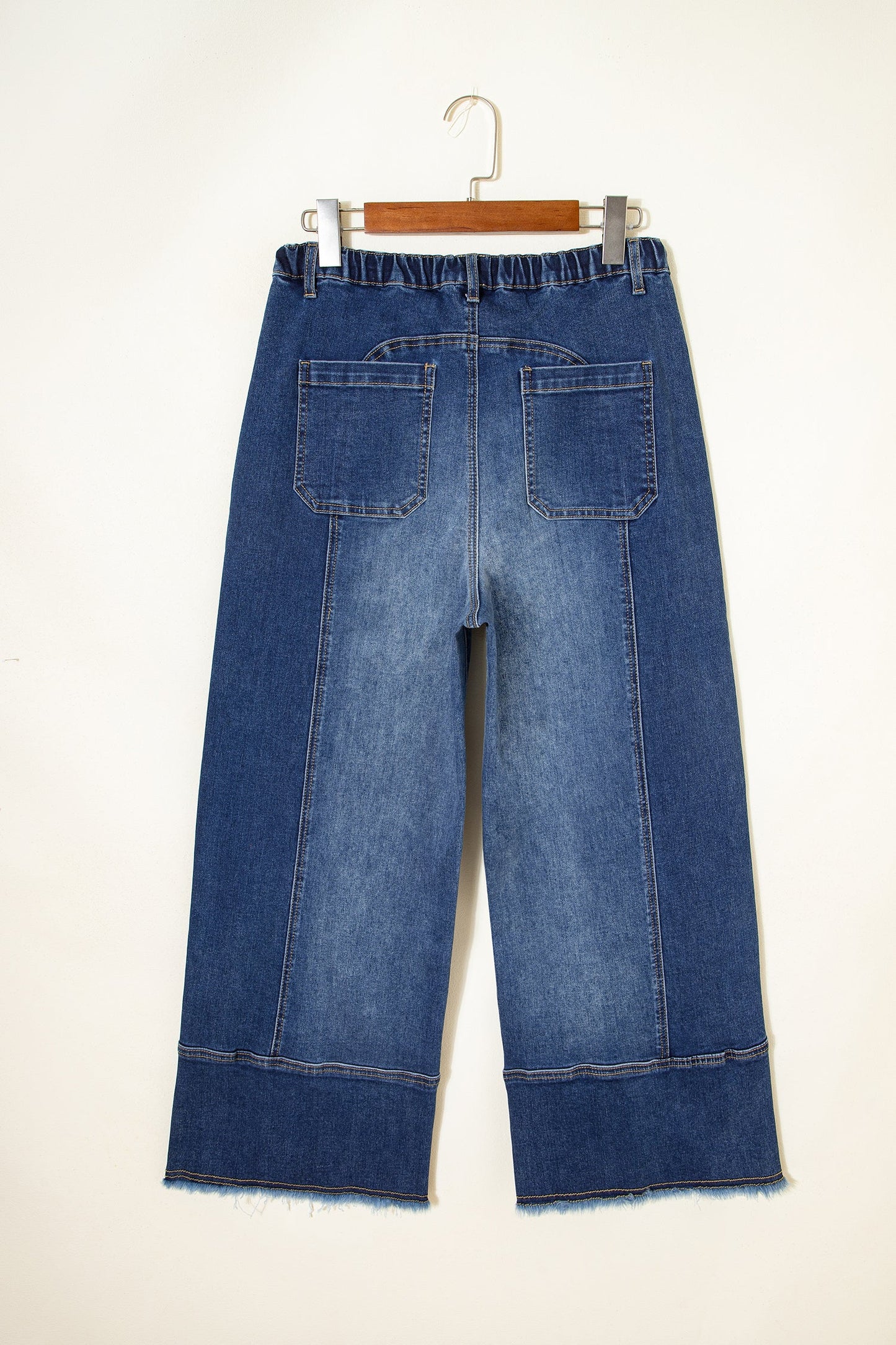 Pantalones vaqueros de pierna ancha con cordón azul de Prusia, detalle de costura y dobladillo sin rematar