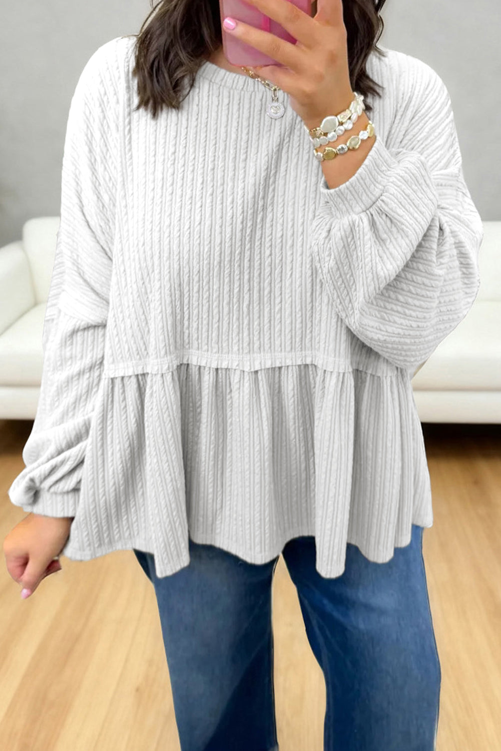 Top peplum de manga larga con hombros caídos texturizado color blanco liso