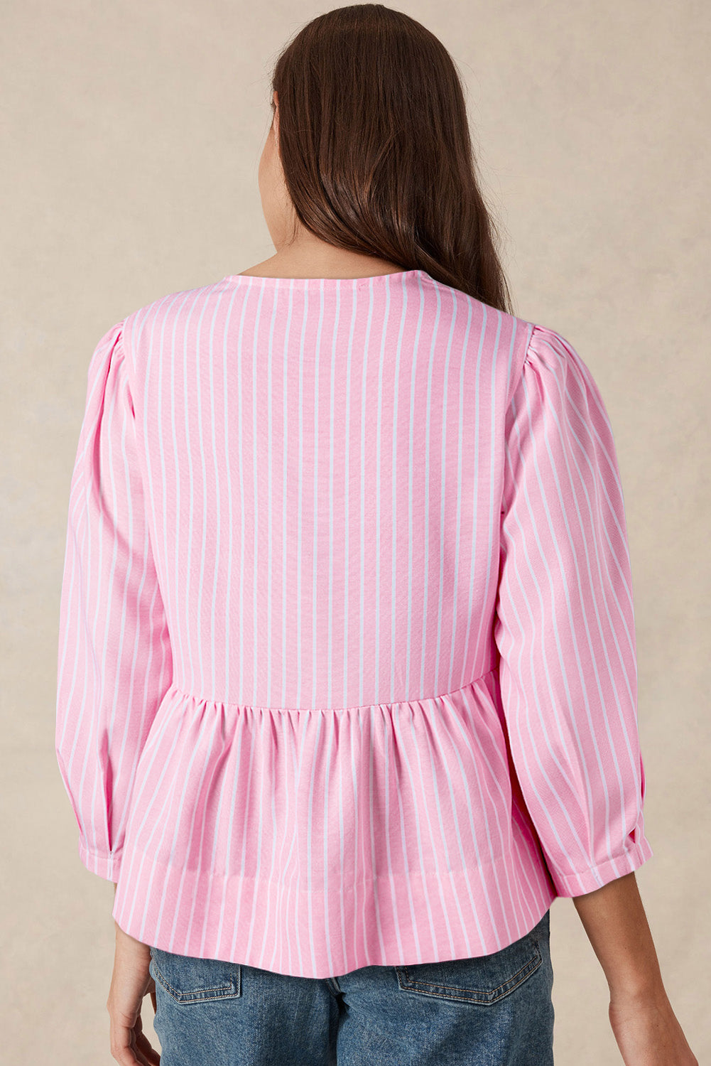 Blusa de cuello redondo a rayas con lazo