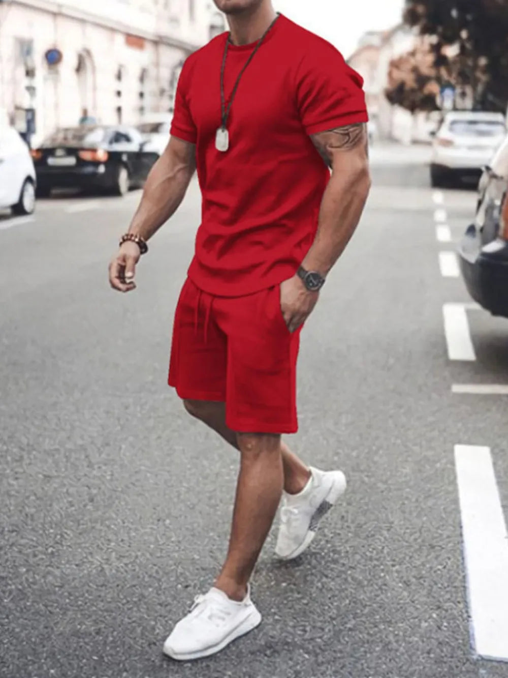 Conjunto de camiseta de manga corta con cuello redondo y pantalones cortos de talla grande para hombre