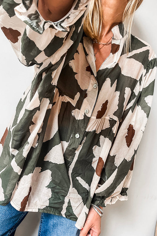 Blusa de trébol de cuatro hojas con estampado floral abstracto, manga abullonada y media botonadura