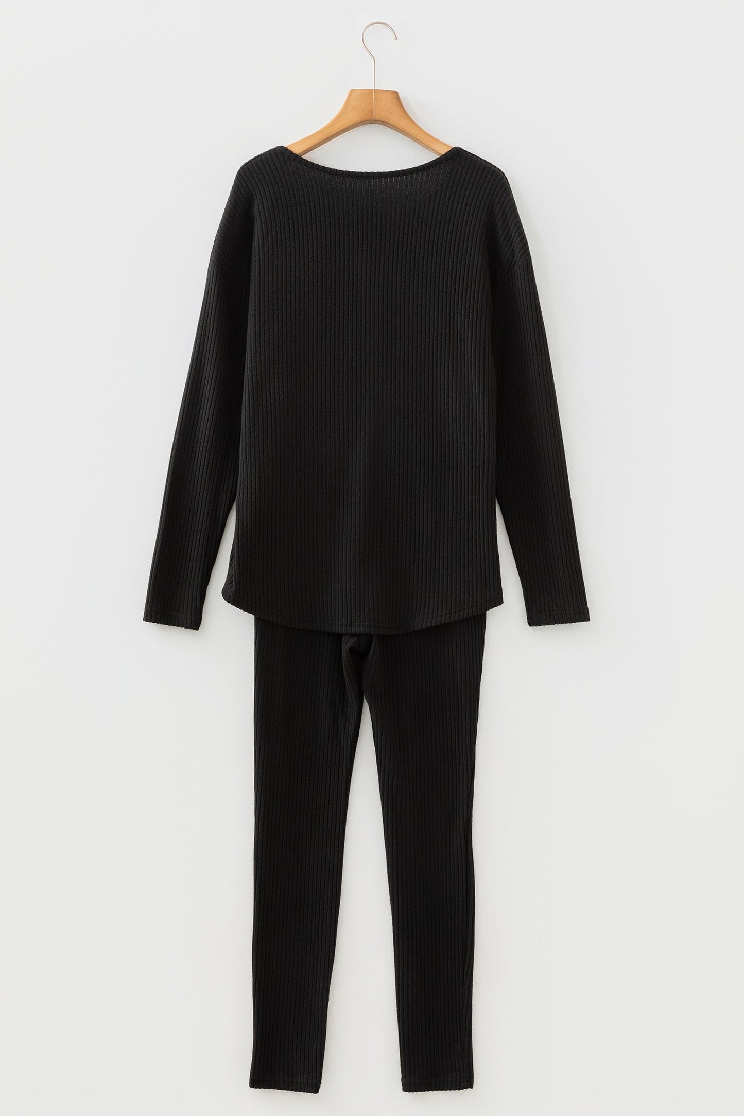 Conjunto de dos piezas de salón de leggings y manga larga de punto acanalado negro con escote en V