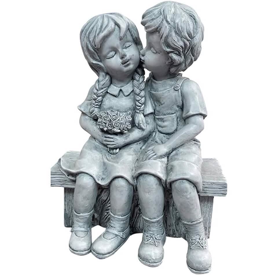 Boy Kissing Girl Statue Sitting on Bench Figurine