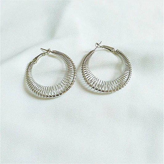 Trendy Spring Curve Earrings in Gold and Silver