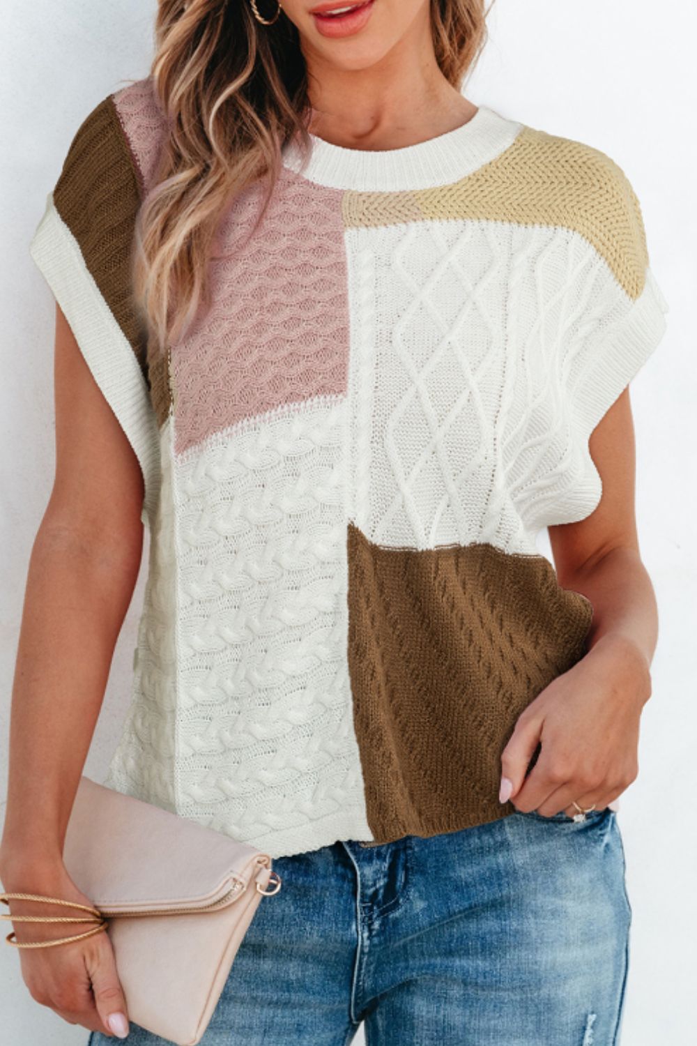 Chaleco de punto trenzado con bloques de color y cuello redondo
