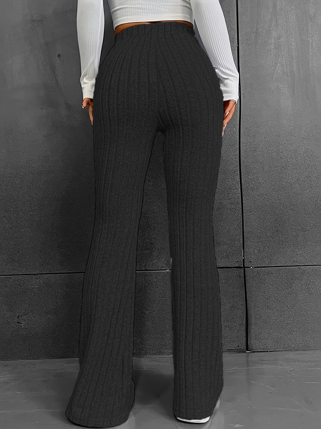 Pantalones acanalados de cintura alta con corte de bota