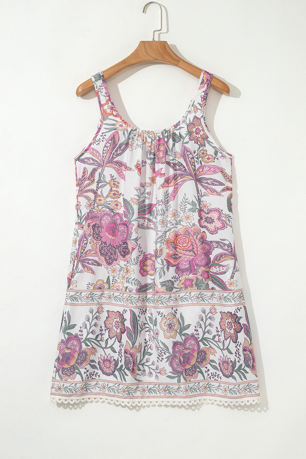 Minivestido sin mangas con cuello de lazo con estampado floral multicolor y flecos