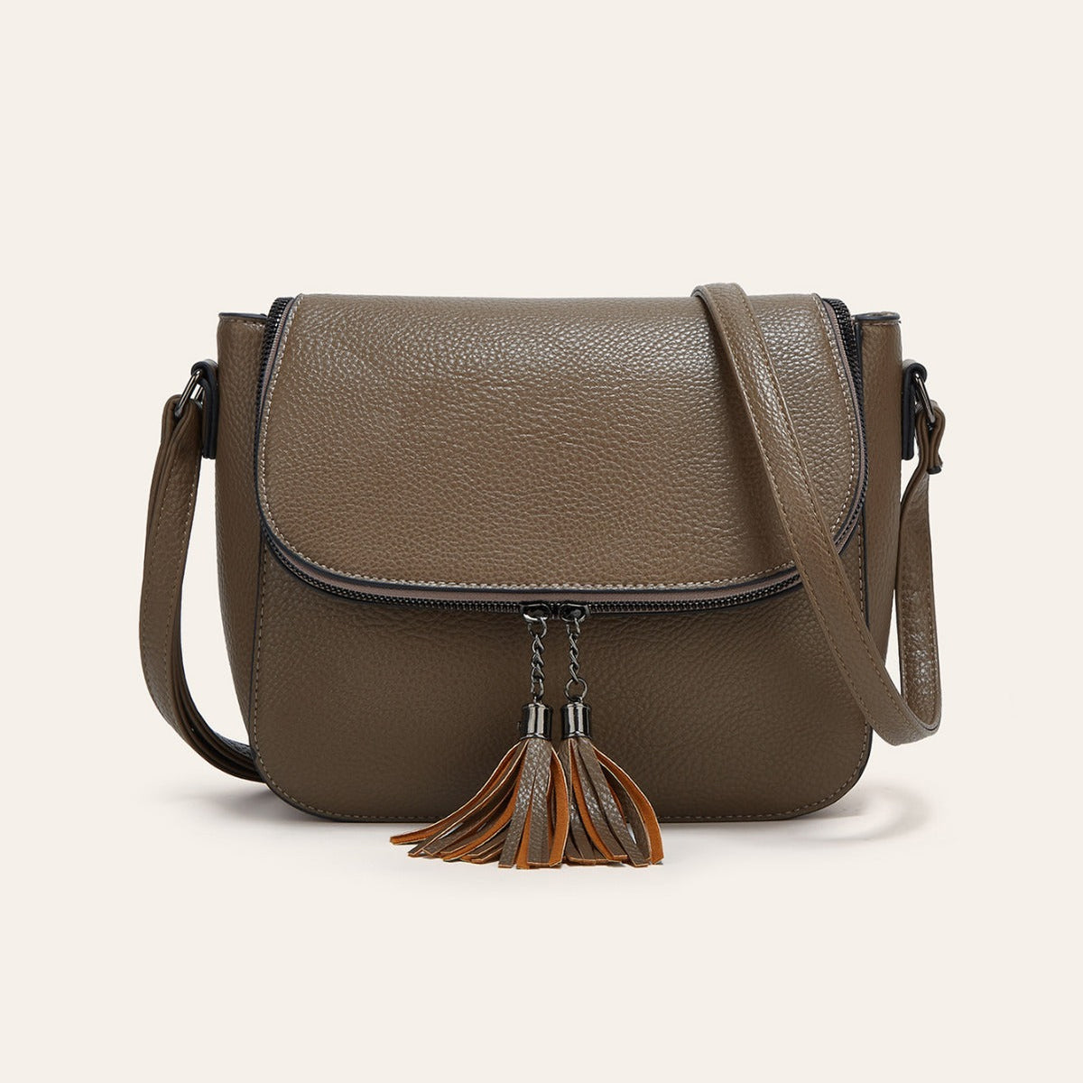 European And American-style Fashionable Flip-top Saddle Bag With Tassels
