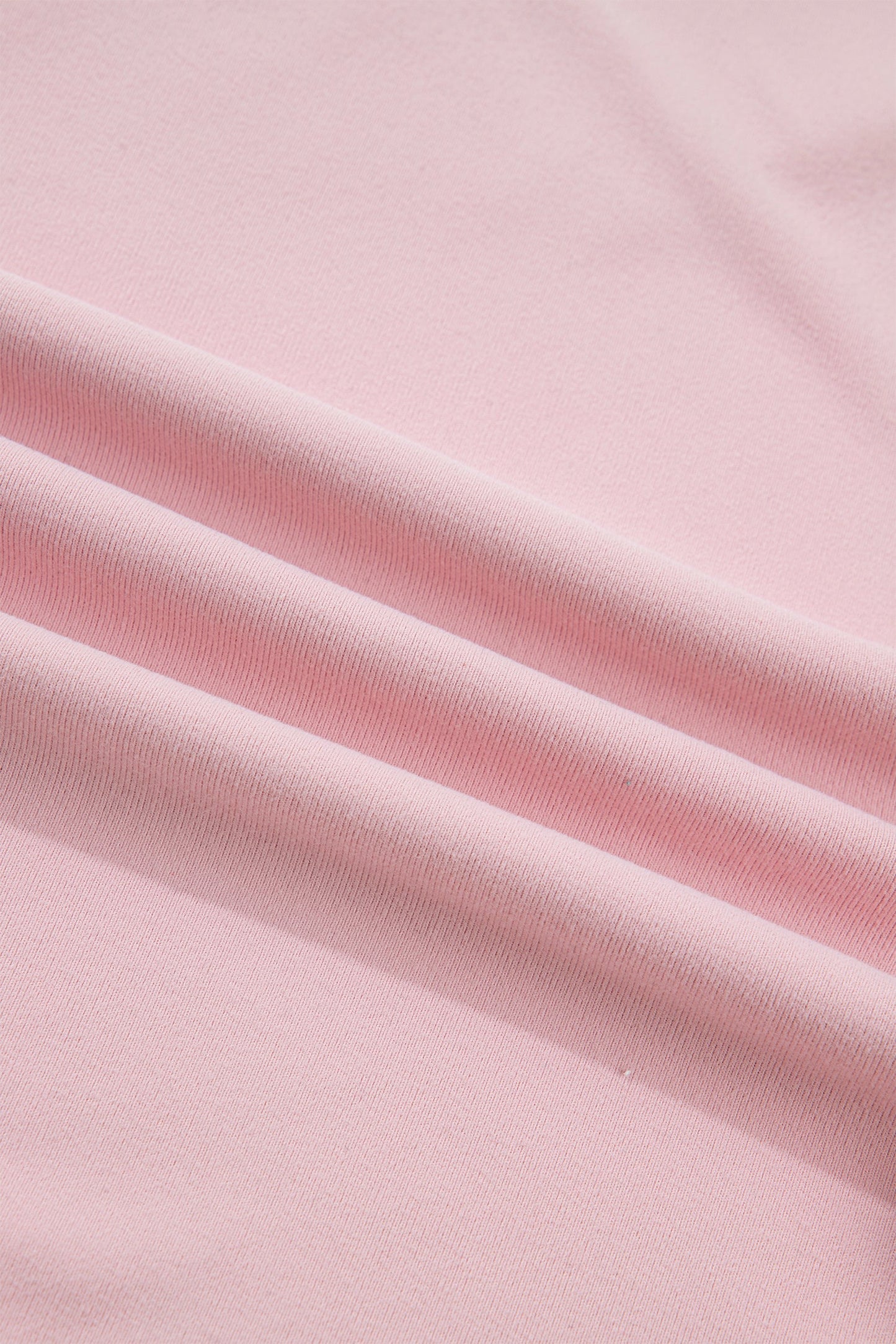 Camiseta de manga larga con retazos texturizados y lazo, color rosa claro liso