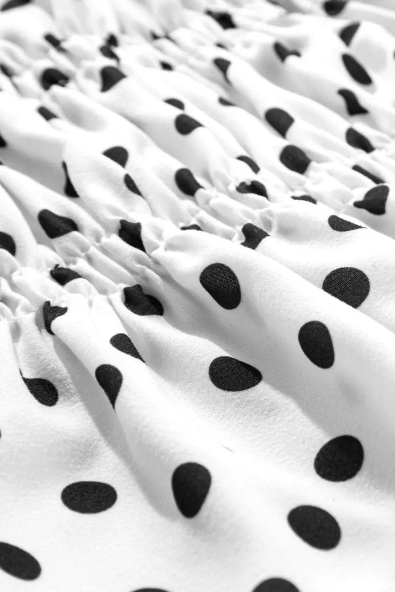 Love Salve Black Polka Dot Peplum Top With Bow Detail