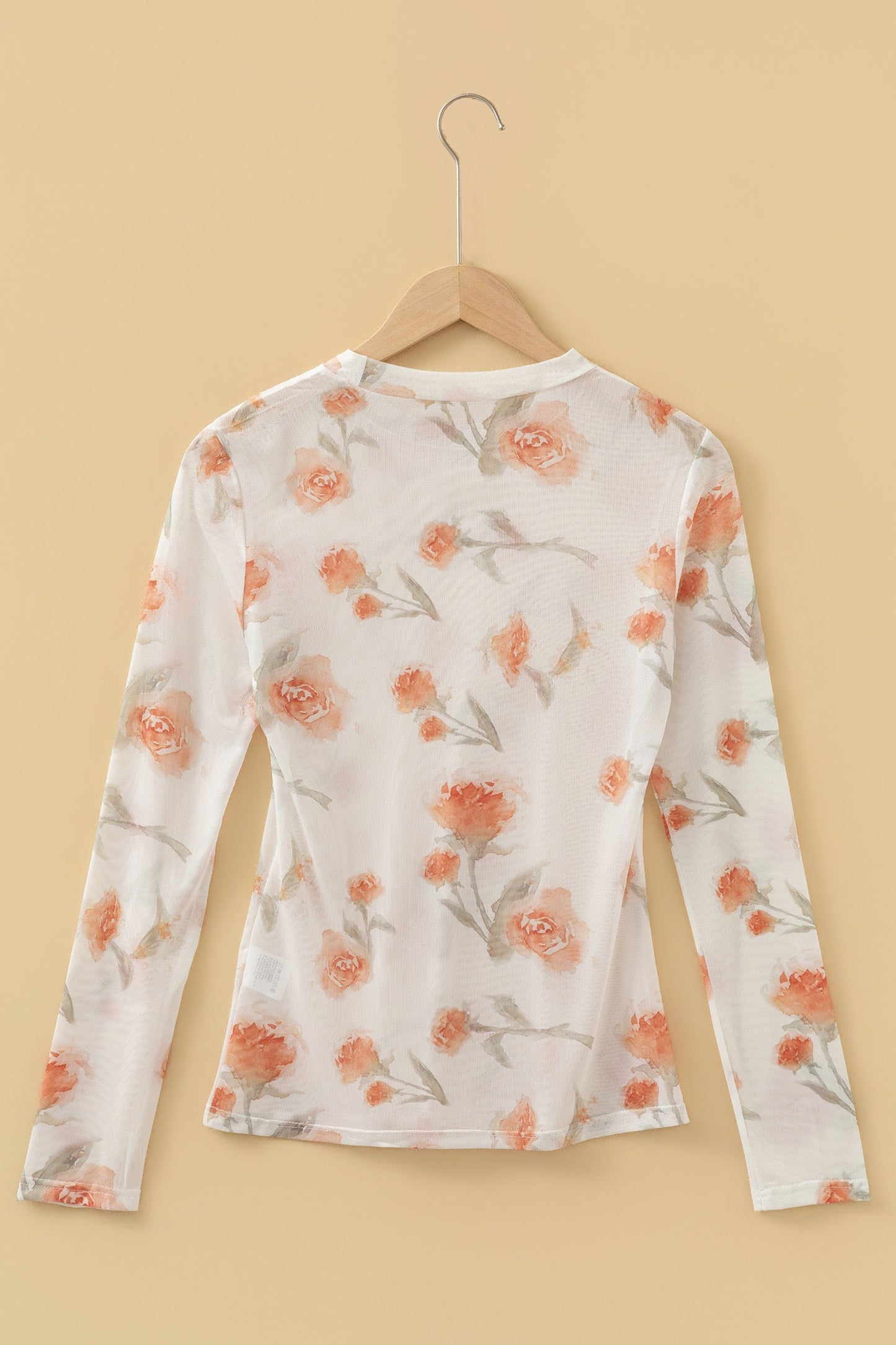Top casual de manga larga de malla con cuello redondo y estampado floral