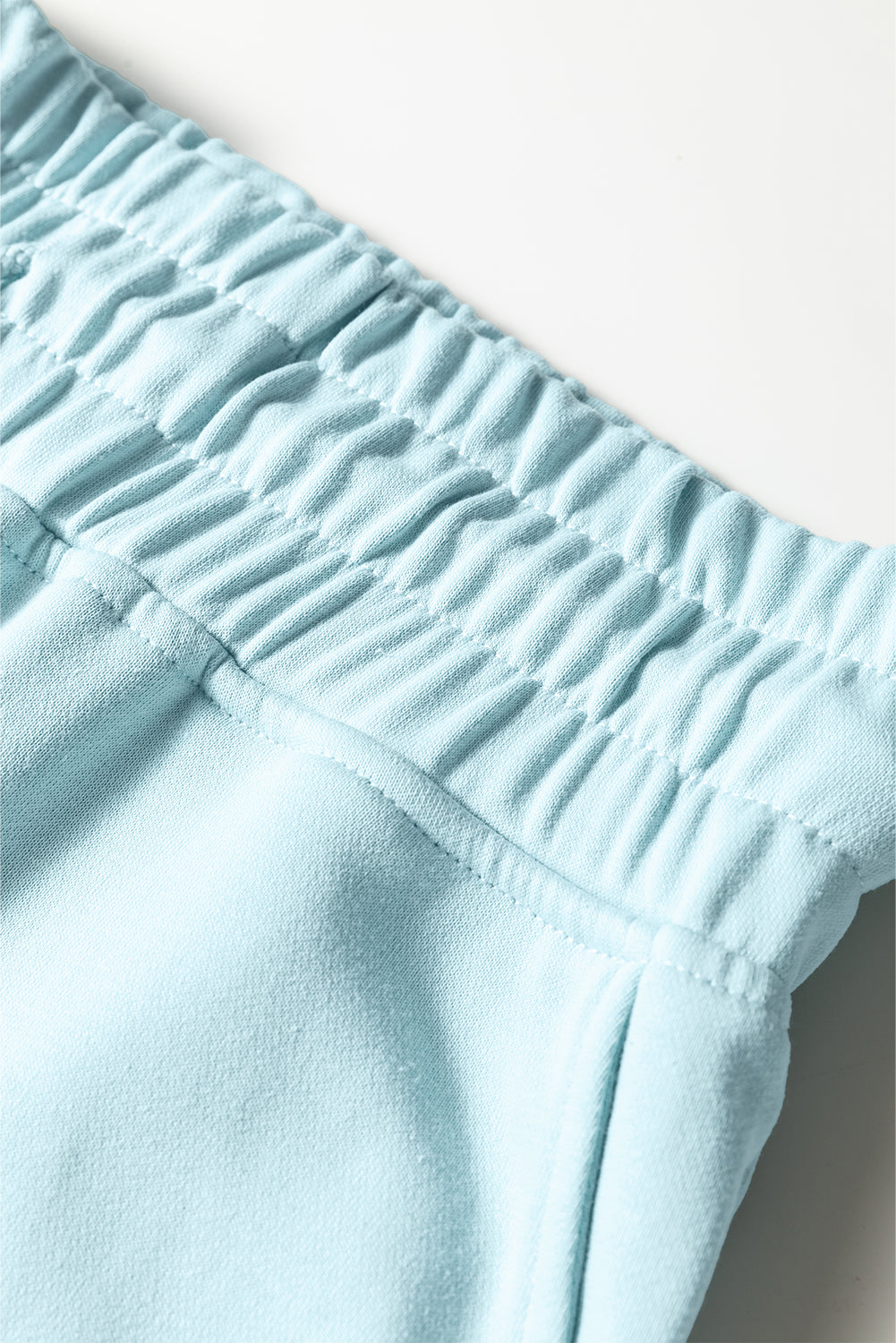 Conjunto de pantalón de pernera ancha con cordón y jersey corto de manga abullonada de hombro caído en azul niebla