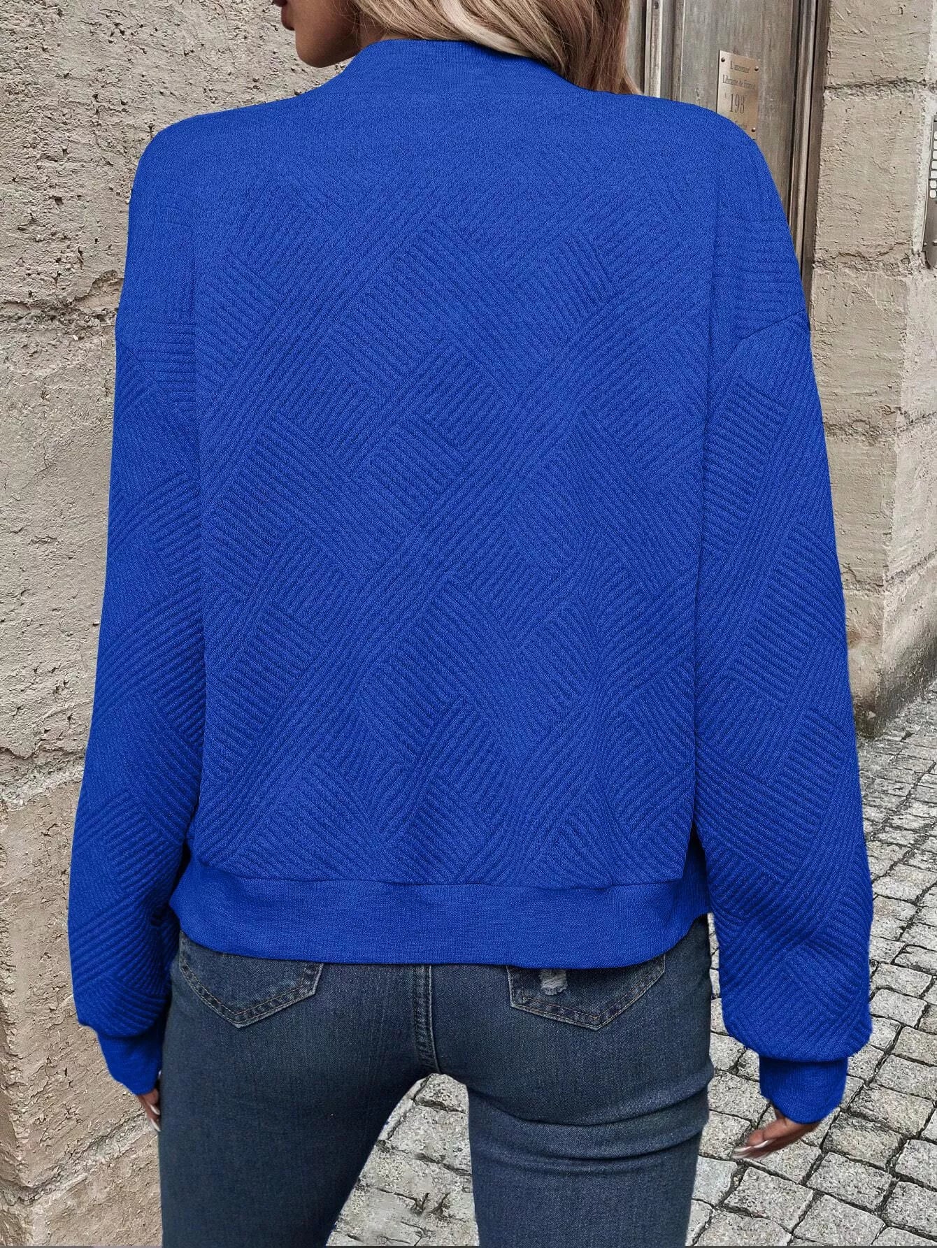 Chaqueta bomber con cremallera y textura