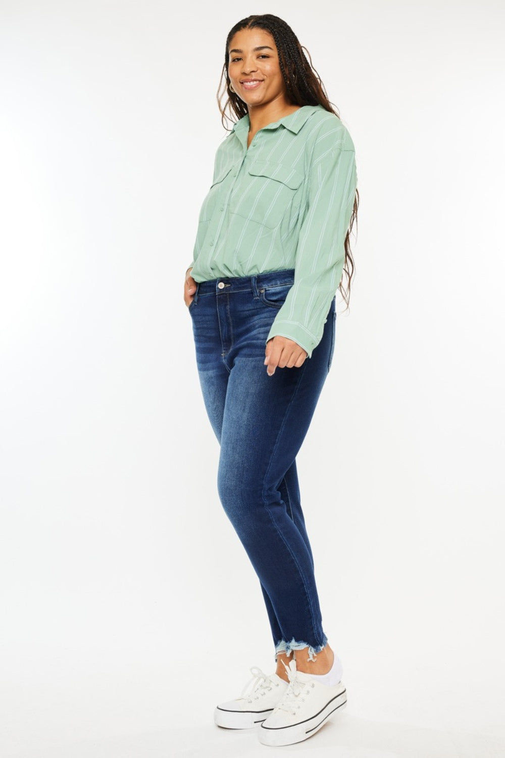 Jeans ajustados Kancan de tiro alto con dobladillo deshilachado hasta el tobillo, talla completa
