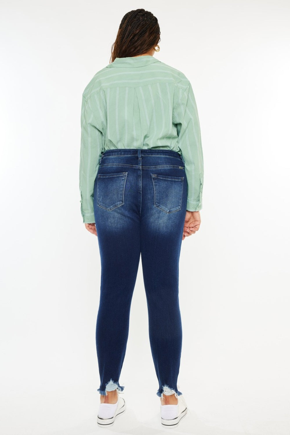 Jeans ajustados Kancan de tiro alto con dobladillo deshilachado hasta el tobillo, talla completa