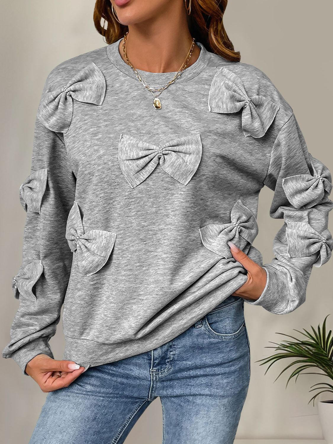 Sudadera Perfee de cuello redondo con lazo y manga larga