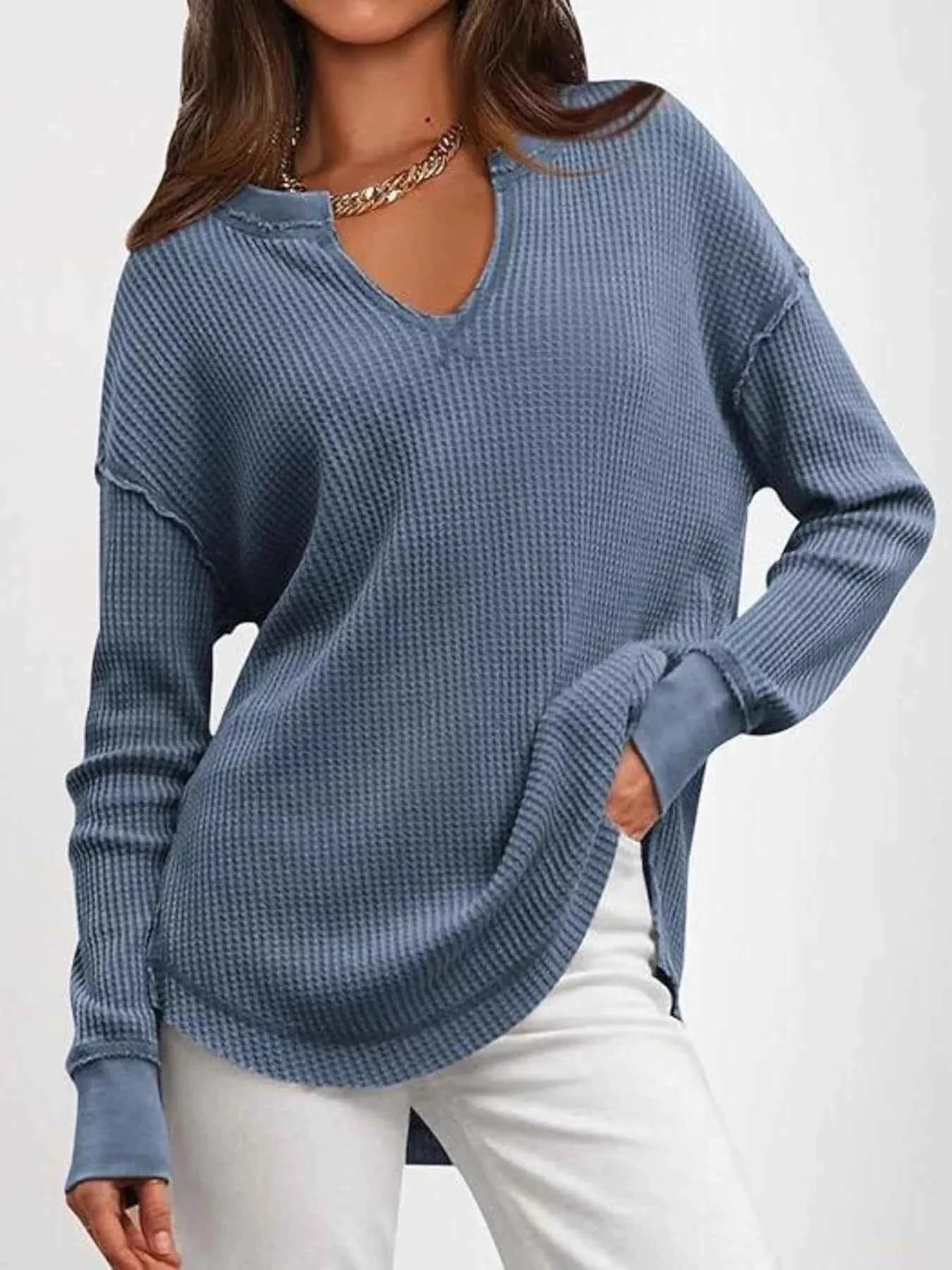 Camiseta de manga larga con aberturas y muescas