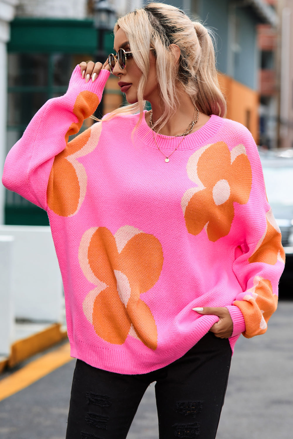 Suéter holgado con estampado floral