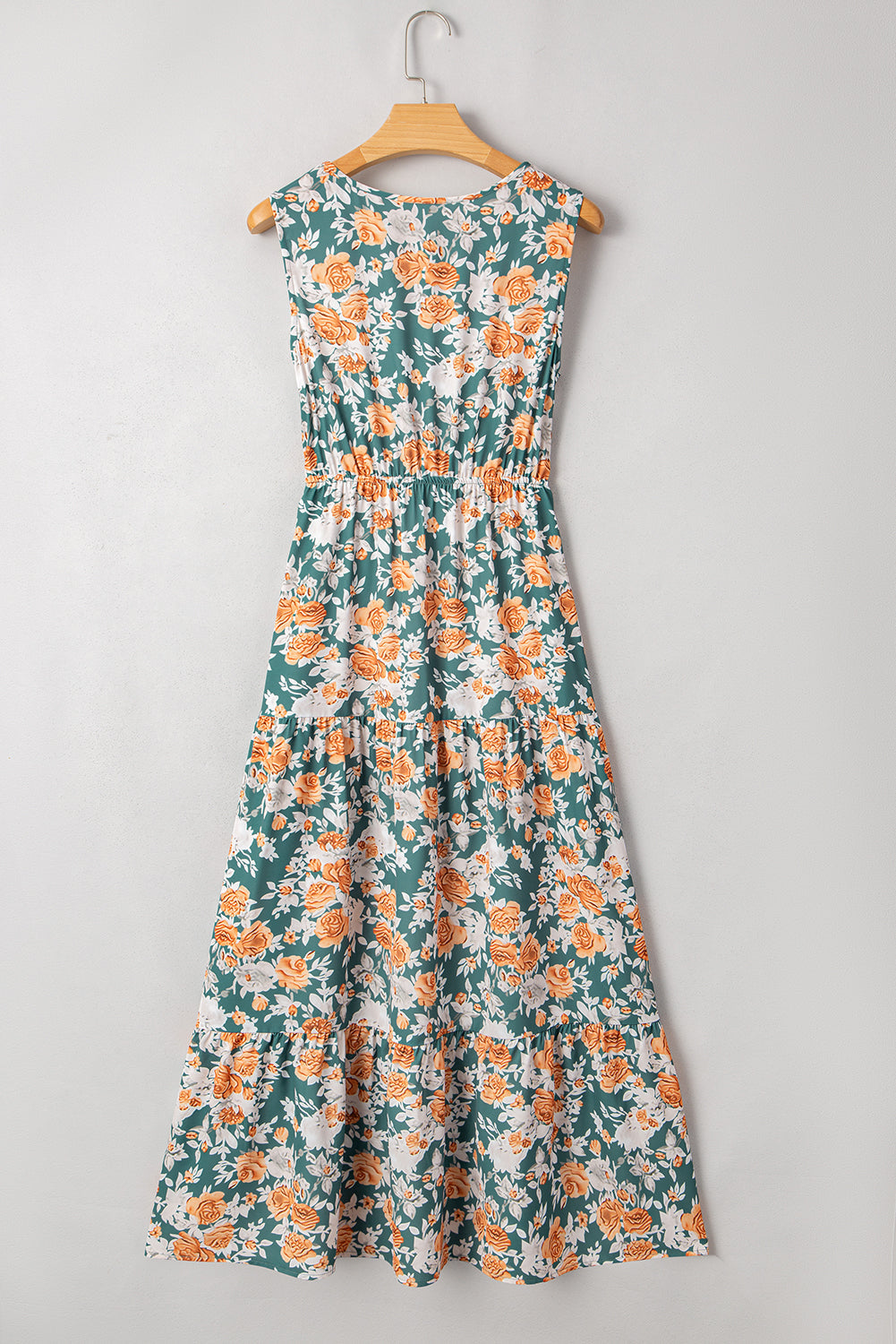 Vestido largo de fiesta sin mangas con cuello de pico, ajuste en la cintura con lazo y estampado floral verde