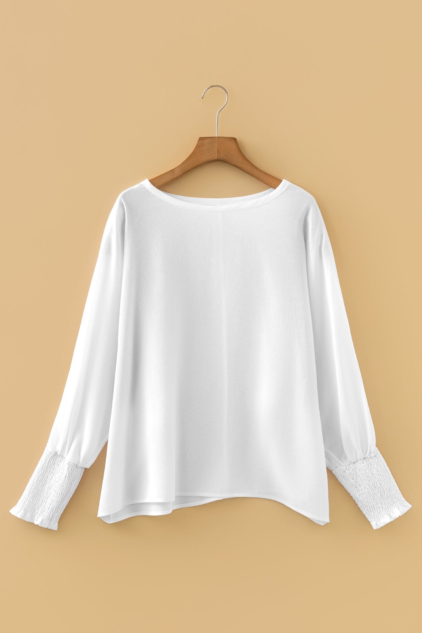Blusa dolmán de manga larga semitransparente con puños blancos fruncidos