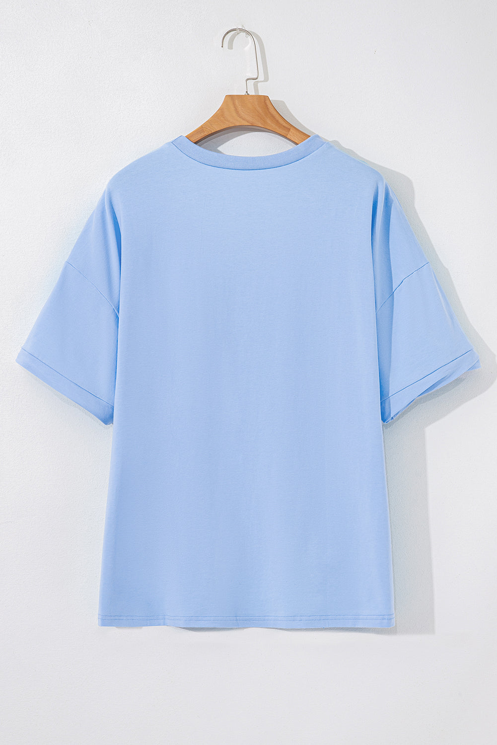 Camiseta de manga media suelta con bajo asimétrico Myosotis