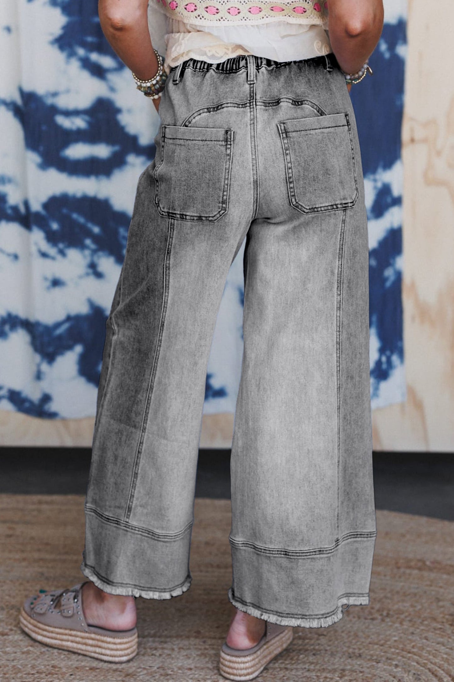 Pantalones vaqueros de pierna ancha con cordón azul de Prusia, detalle de costura y dobladillo sin rematar
