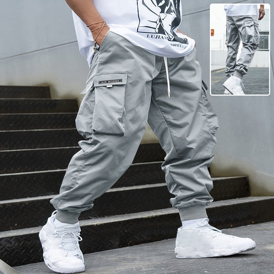 Pantalones cargo de hombre con múltiples bolsillos y cordón