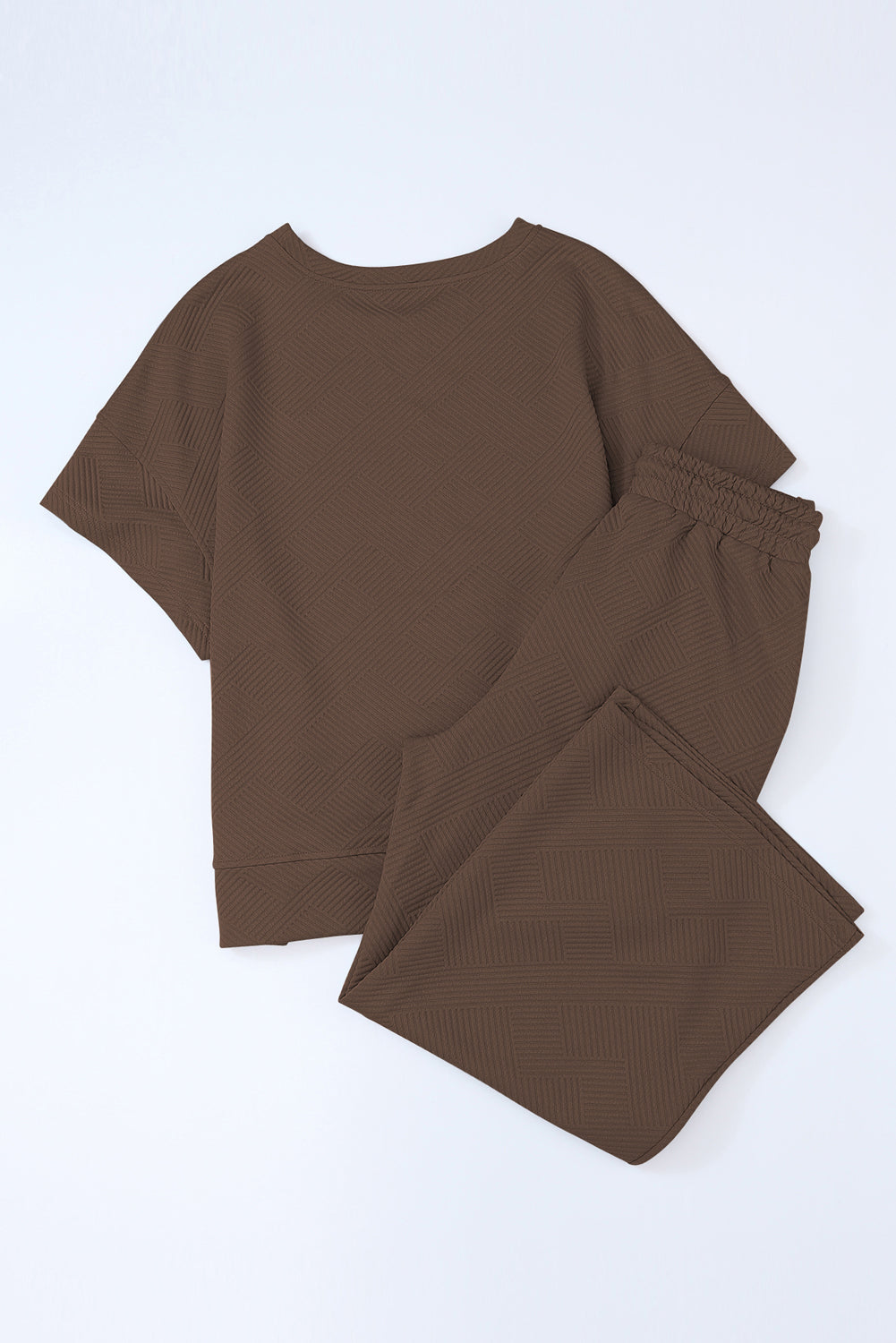 Conjunto de camiseta holgada texturizada y pantalones con cordón ajustables, color café